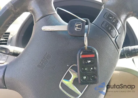 2010 Honda Odyssey Ex-L z USA, uszkodzony, nr VIN 5FNRL3H77AB048261